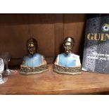 Two Art Deco style painted brass models of Dan