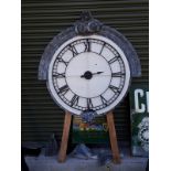 Large decorative clock face with lead paint effect.