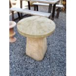 Stone model of mushroom.