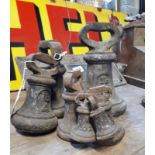 Set of seven 19th. C. cast iron bell butcher's weights.