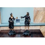 Pair of bronze figures in the Classical style. { 14'' H X 6'' W }.