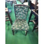 Twelve upholstered restaurant dining chairs.