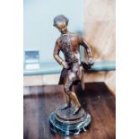 Bronze figure of a violinist. { 19'' H X 8'' W }.