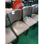 Set of eight leather restaurant dining chairs.