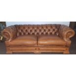 Vintage Dellbrook Tan Leather Chesterfield Couch, 78in wide.