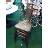 Set of seven metal patio chairs.