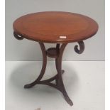 Circular Occasional Table with brass toes, 25ins dia.