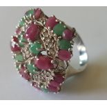 Large Lady's Dress Ring set with green and purple stones, hallmarked.