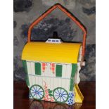 Ceramic Biscuit Barrell in the form of a Romany gypsy caravan. 8in (h) x 7in (w).