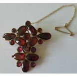 9ct Gold Brooch set with Garnets, with pin and safety chain.