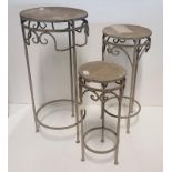 Three Round Topped Graduated Metal Plant Stands.