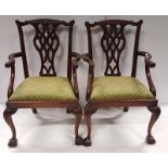 Pair of Carved Mahogany Chippendale Style Armchairs on ball & claw feet.