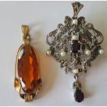 Silver Brooch/Pendant set with seed pearl and garnet;