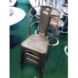 Set of seven metal patio chairs.