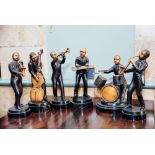 Six bronze figural group - The Jazz Band. { 14'' H }.