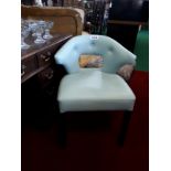 Ex Shelbourne light blue leather tub chair.