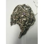 Silver Brooch: Art Deco Style Woman's Face & Headdress, set with an amethyst, 7cm x 4.5cm.