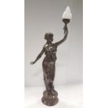 Bronze Figure Of Lady Holding a Glass Flame On a Matching Pedestal, 98.5ins.