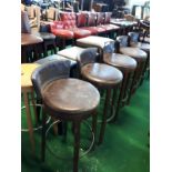 Set of five leather high pub stools.