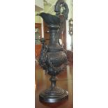 Heavy Relief Cast Bronze decorative Ewer on circular stem base, 24.5ins high.