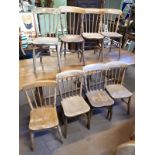 Eight ash and elm stick back kitchen chairs