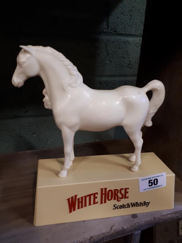 WHITE HORSE SCOTCH WHISKY plastic advertising figure.