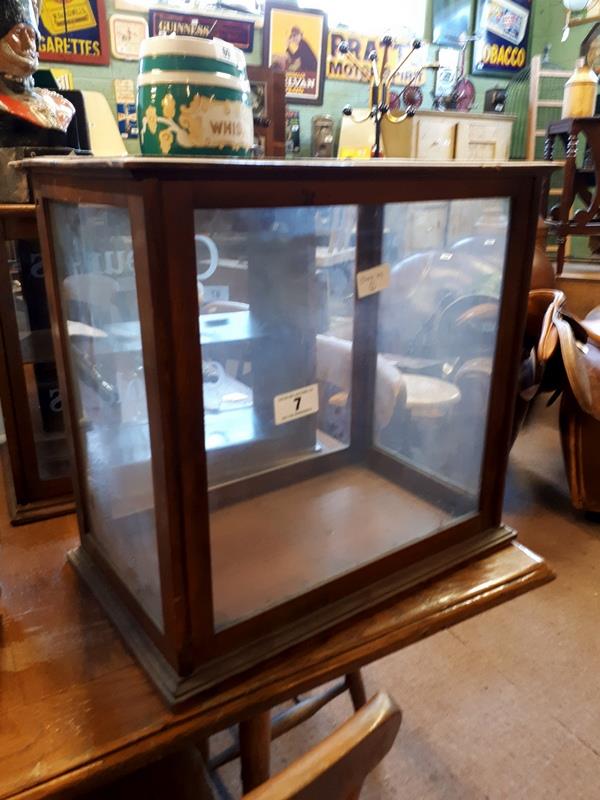 Glazed laboratory display case.