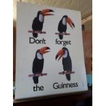 Cardboard DON’T FORGET THE GUINNESS print with four toucans.