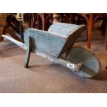 Late 19th.C. child's wheelbarrow with original blue paint.