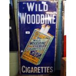 Enamel WILD WOODBINE advertisement.