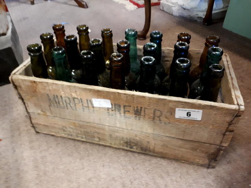 Twenty one 1950's GUINNESS bottles in wooden crate. Richard Farrell Youghal.