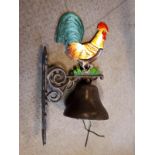 Cast iron bell in the form of a Rooster.