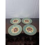Set of four Aynsley fine bone china plates with hand painted centre panel and gilded decoration.