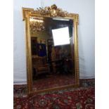 Decorative WIV gilt overmantle mirror with egg and dart moulding.