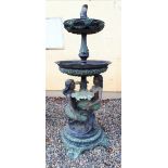 Decorative two tier bronze fountain with two mermaids holding the bowls aloft. { 180cm H }.