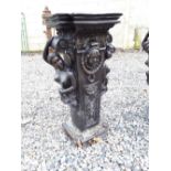 Decorative square bronze torchere decorated with maidens, scrolls and shells. { 79cm H }.