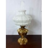 Brass Aladdin lamp with milk glass mushroom shade.