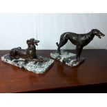 Two Art Deco bronze Irish hounds on marble bases.