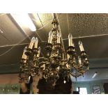 Exceptional quality gilded brass twelve branch chandelier.