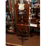 Victorian copper and metal standard lamp with yellow etched tulip shade.