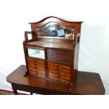 Early 20th C. walnut dentist cabinet with inset marble top.
