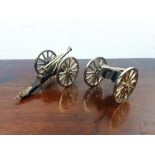 Pair of miniture brass and wooden cannons.