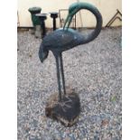 Bronze model of a stork on wooden base.