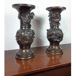Pair of decorative bronze Oriental vases decorated with birds and foliage. { 46cm H }.