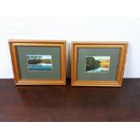 Pair of framed oil on board lake scenses.