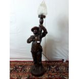 19th C. spelter table lamp in the form of a spanish soldier. 104 cm tall.