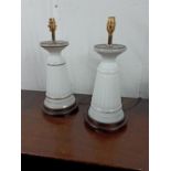 Pair of Edwardian milk glass table lights on mahogany bases.