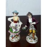 Two ceramic figurines of a Lady and Gentlemen {16cm H}.