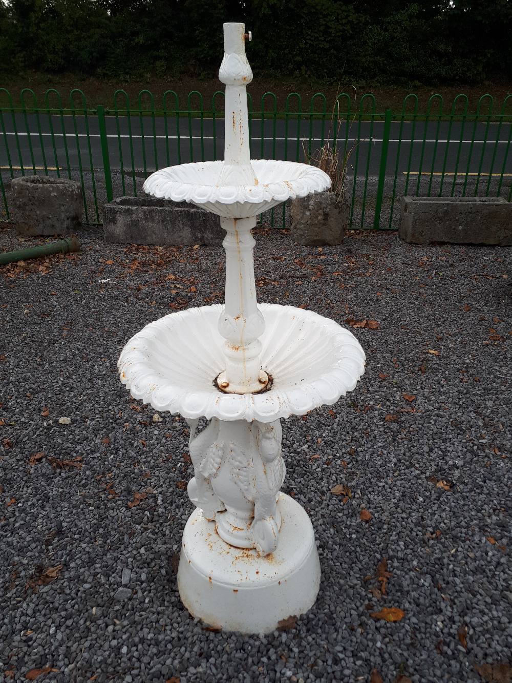 Decorative cast iron fountain, the base decorated with swans.