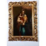 19th. C. Oil on Canvas Madonna and Child mounted in a decorative gilt frame. { 84cm H X 56cm W }.